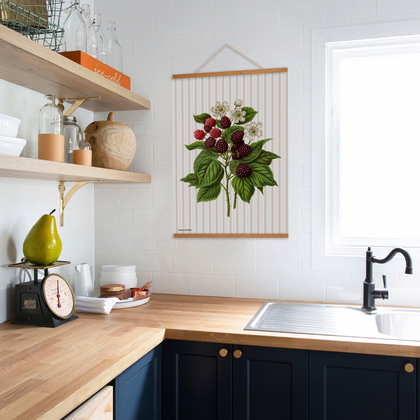 Flour sack cotton tea towel hanging on hook in kitchen