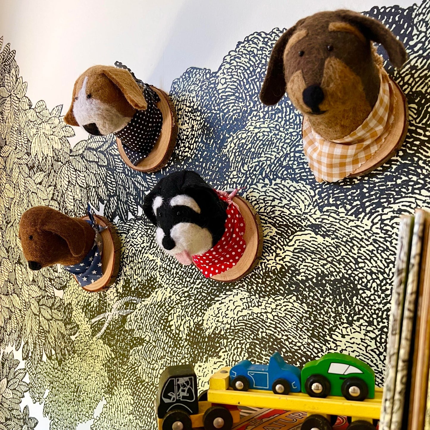 Felt dog decor on nursery wall without hook