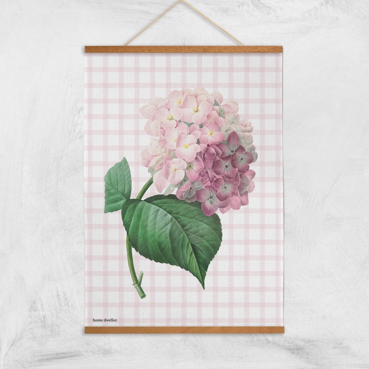 Flour sack cotton tea towel hanging with magnetic print hanger