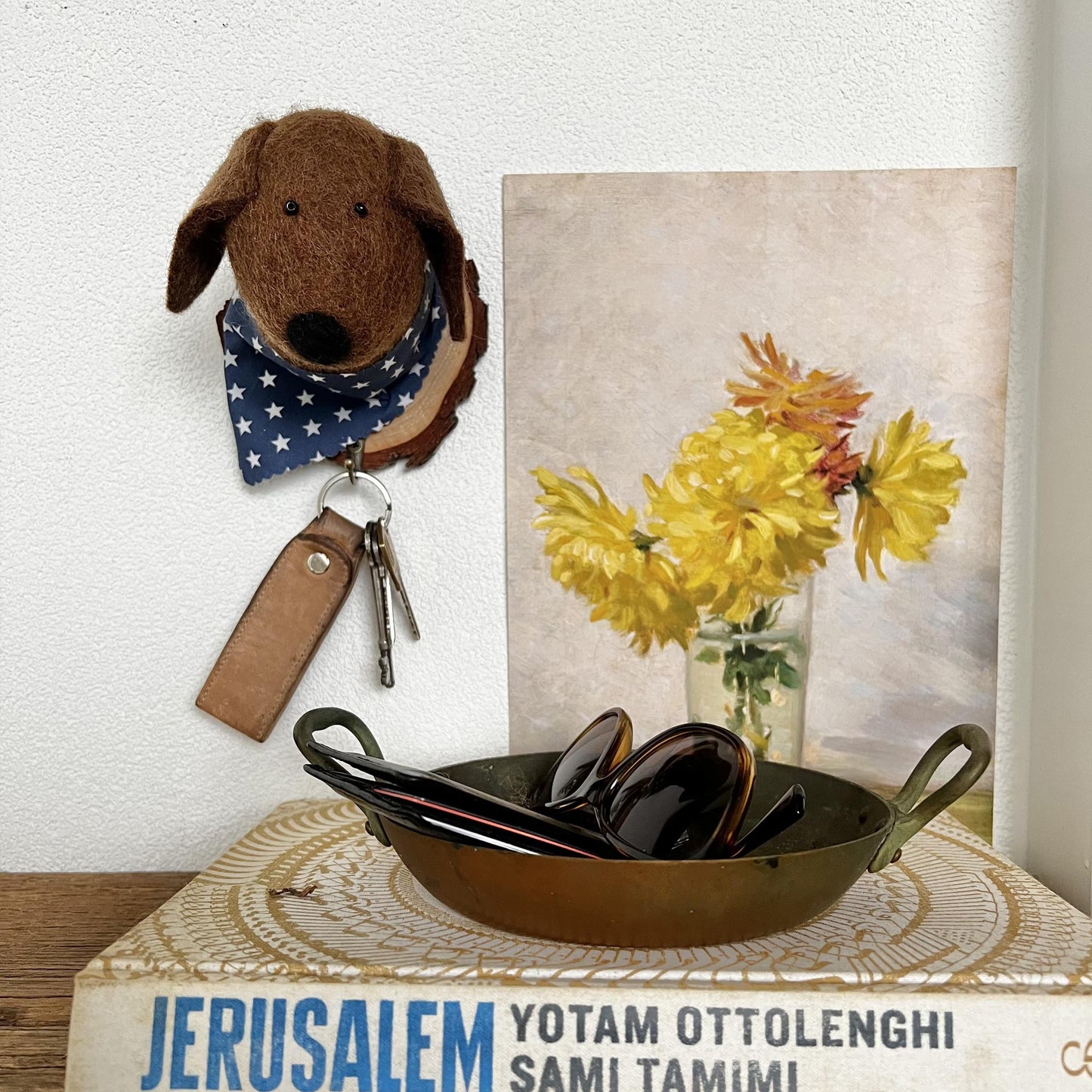 Dog wall hook used as key holder in entryway