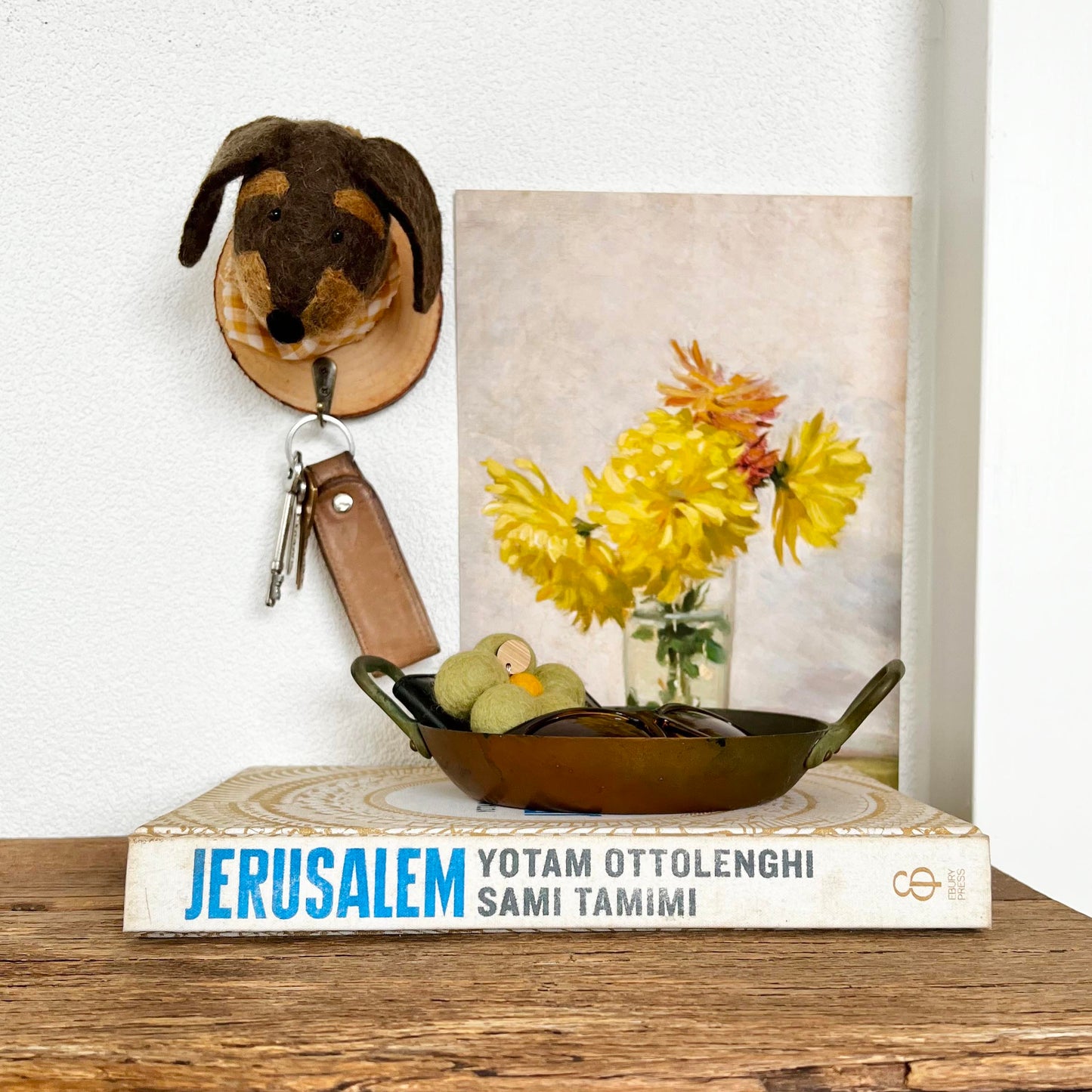 Dog wall hook used as key holder in entryway