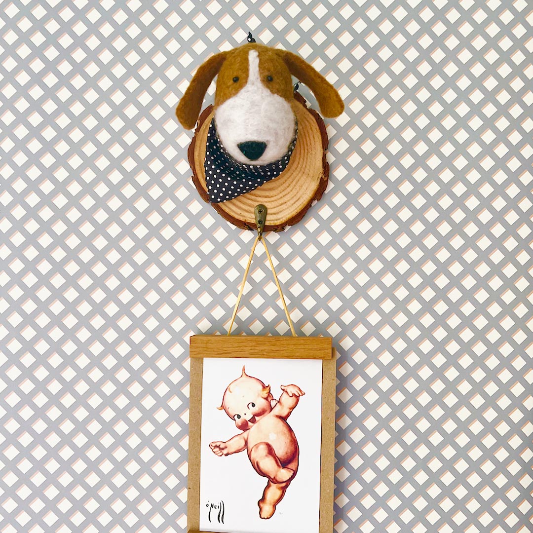 Dog wall hook holding art print