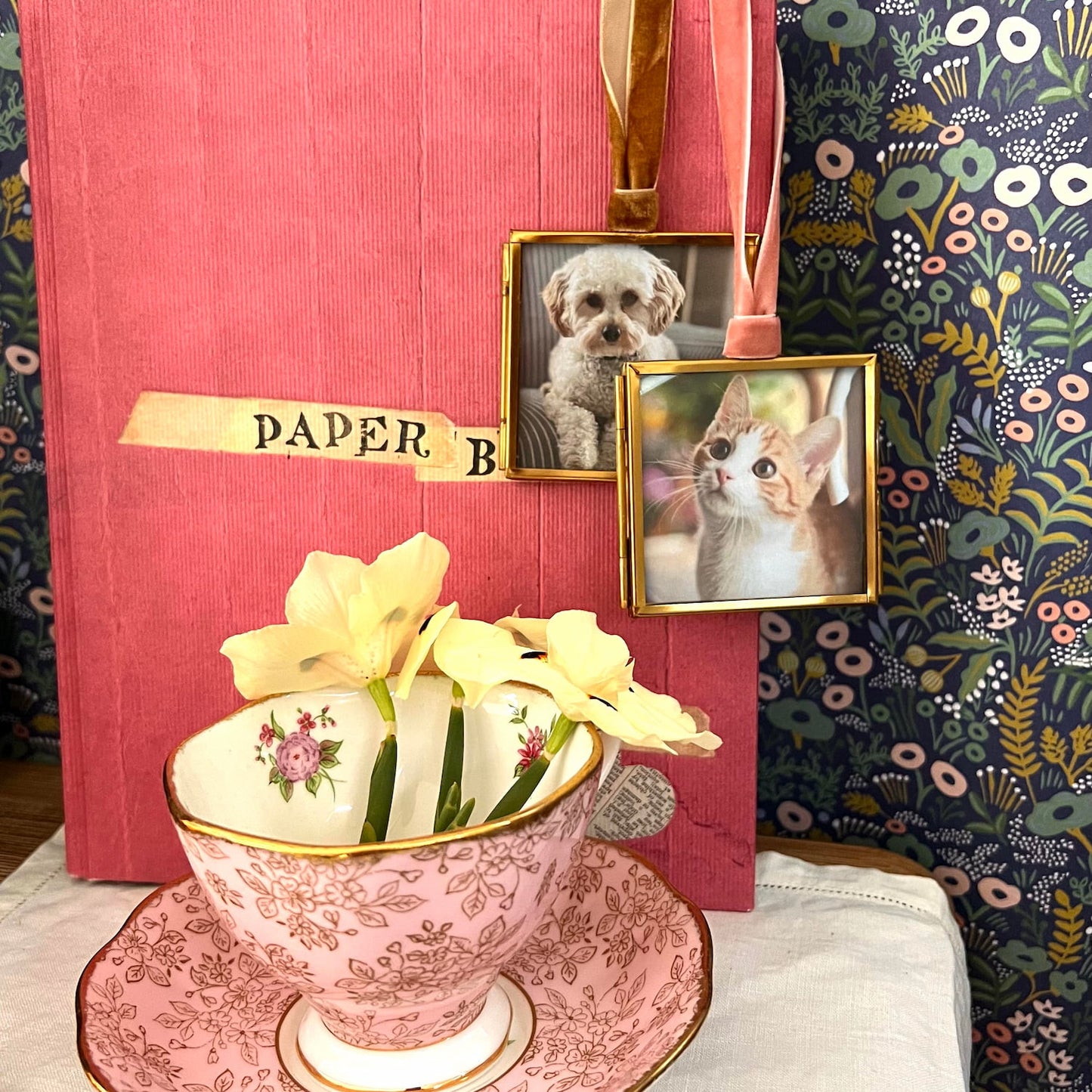 pet photos displayed in Mini Glass and brass frames on bedside