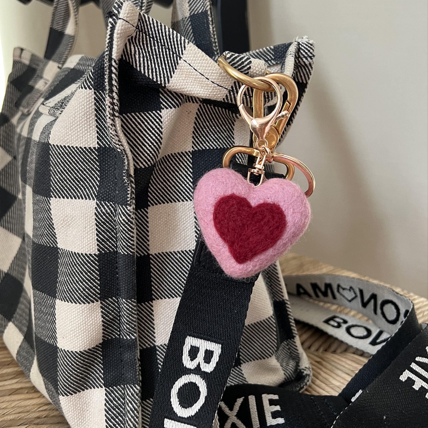 Handmade wool heart charm as bag accessory