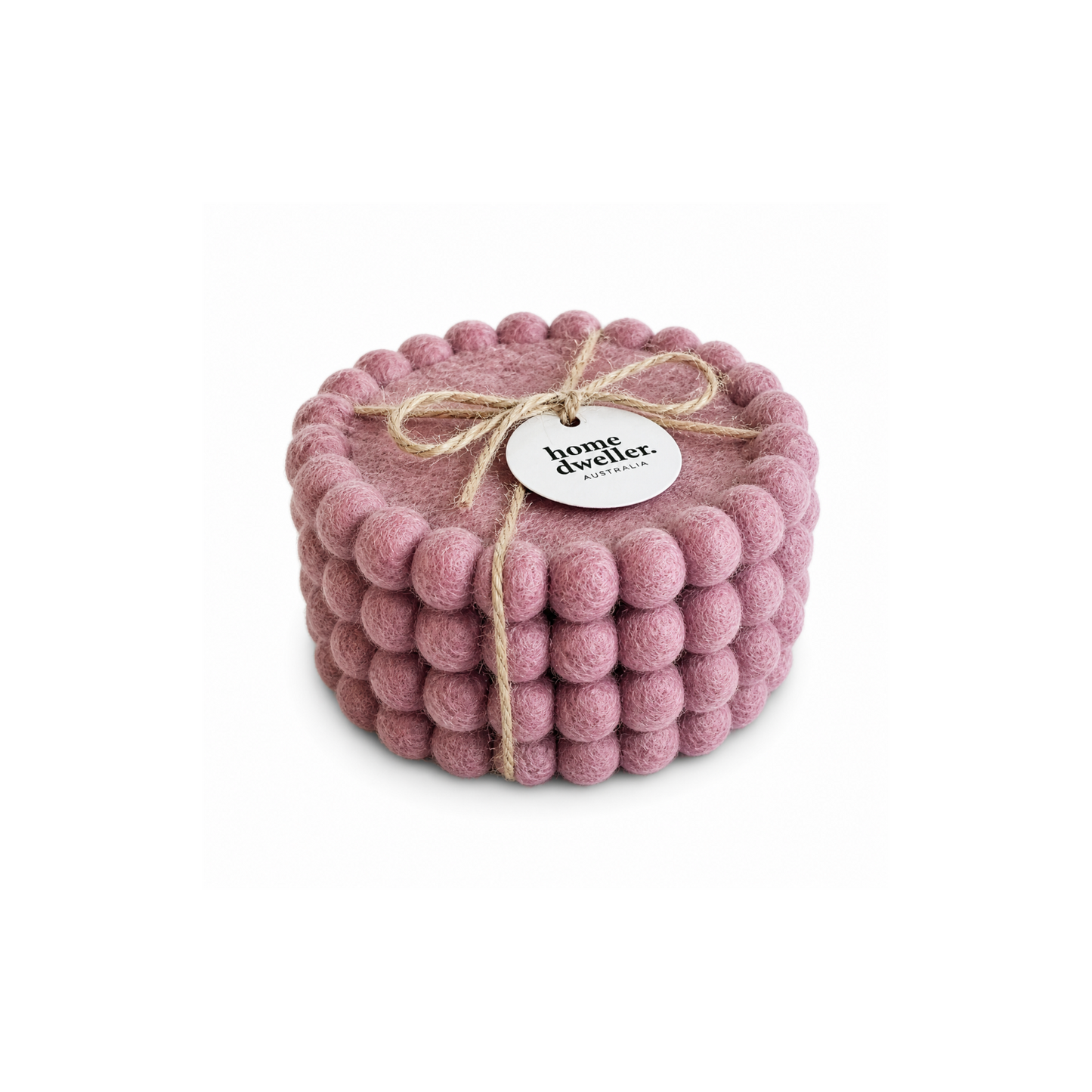 Pink textured felt coaster with a string and tag on a white background