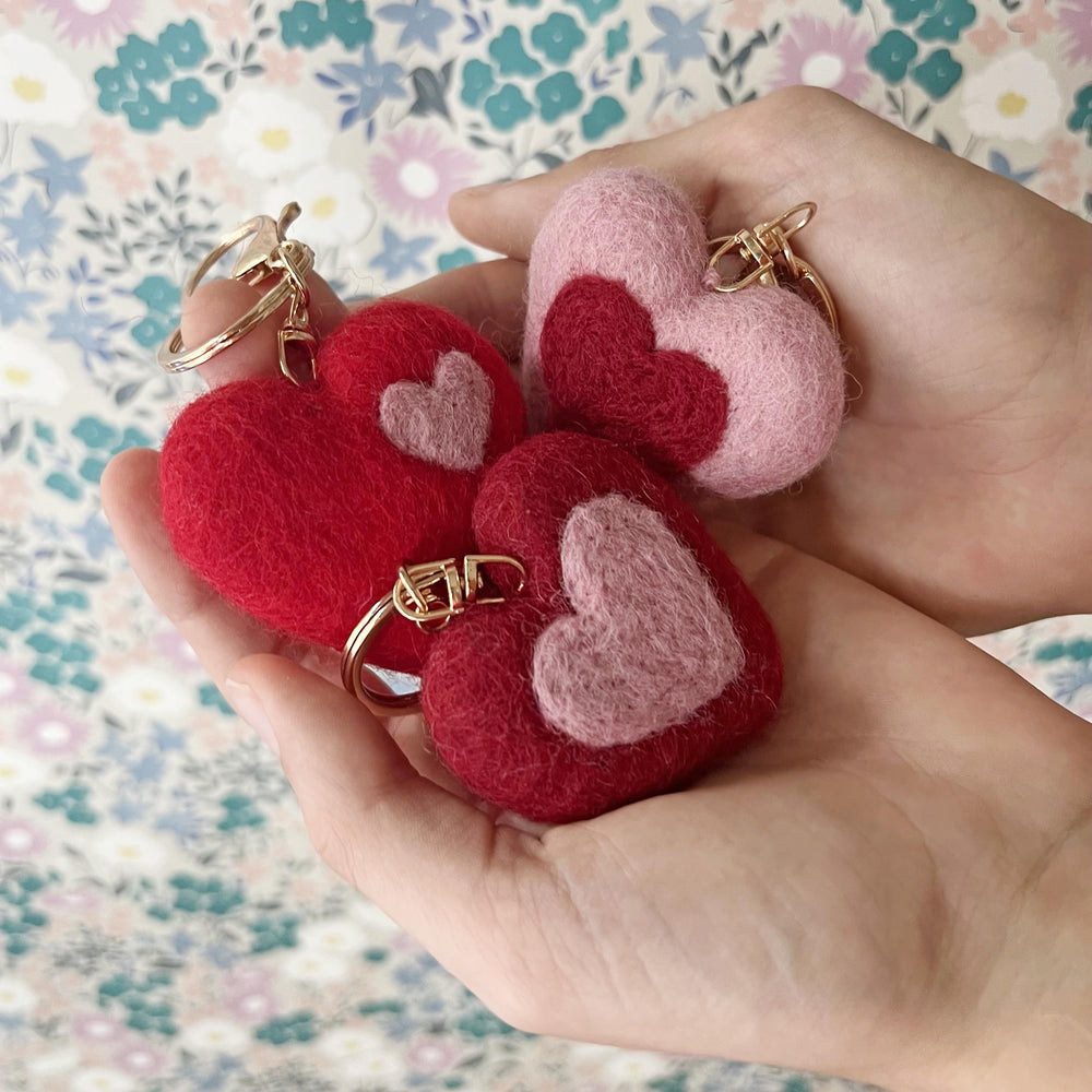 
                  
                    Fair trade felt heart keychain in gift bundle display
                  
                